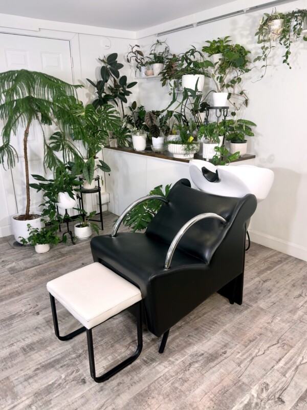 A photo of the studio showing a lounge chair for hair services.
